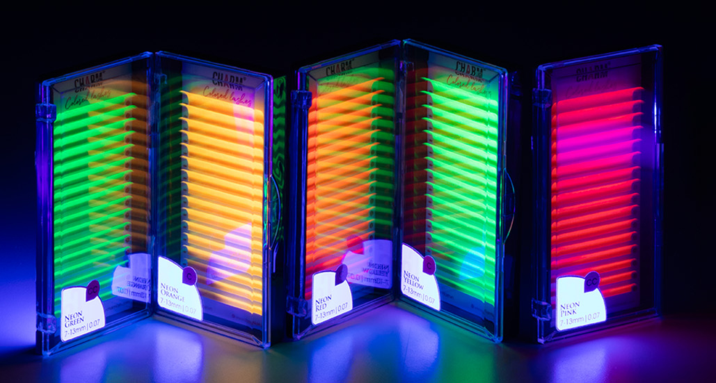 Colored Eyelashes Are Back - Time to Brighten Your Lash Game! Display of UV Neon colored eyelashes collection at CharmLash