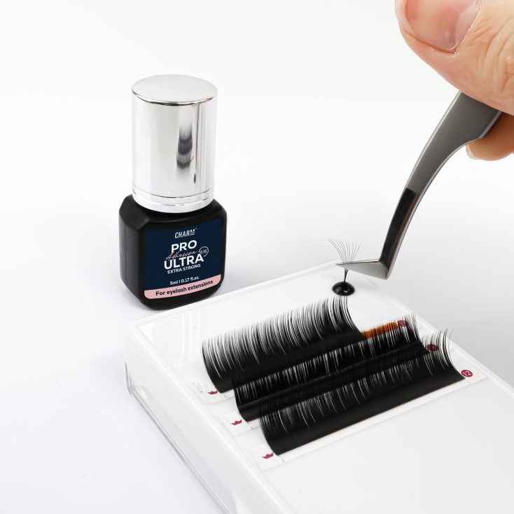 Lash adhesive viscosity explained - for choosing the right lash glue Applying lash extensions using a medium viscosity adhesive.